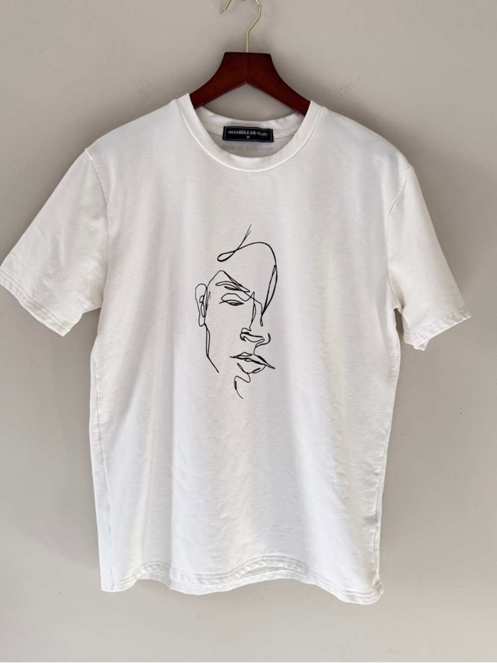 Minimalist White Graphic Tee with Line Art